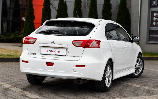 Mitsubishi Lancer cena 32900 przebieg: 150000, rok produkcji 2014 z Radom małe 596